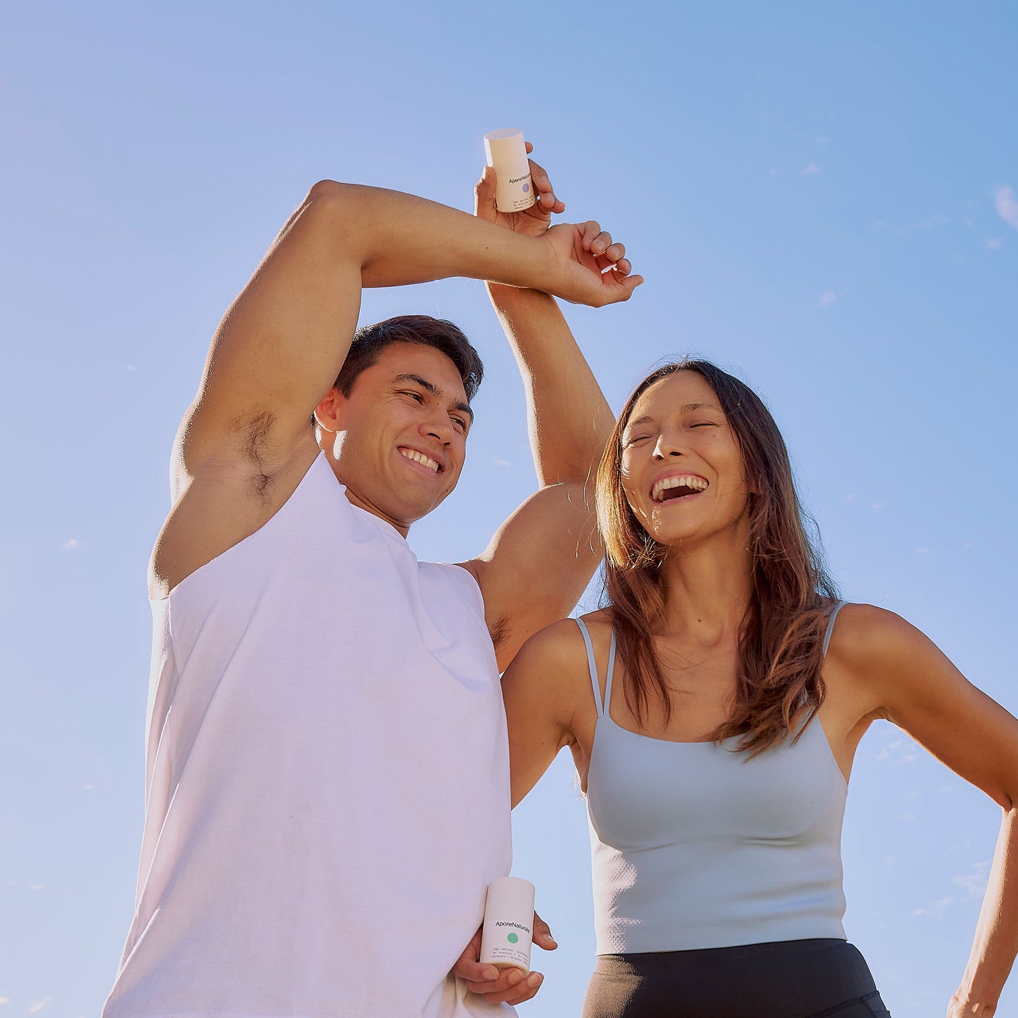 laughing couple using natural deodorant